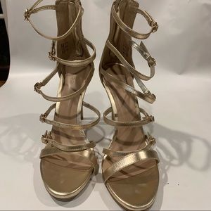 Gold strappy Aldo heel